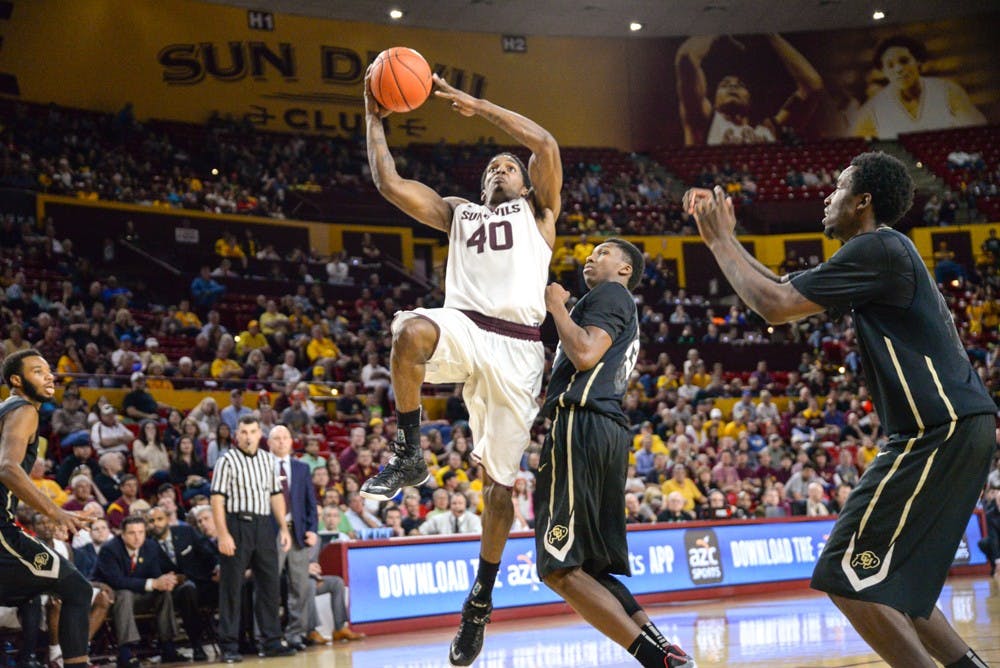 Senior Shaquielle McKissic takes to the rim on Saturday, Jan. 17, 2015 against the Colorado Buffaloes at Wells Fargo Arena in Tempe. The Sun Devils went on to with against the Buffalos 78-72. (J. Bauer-Leffler/The State Press)
