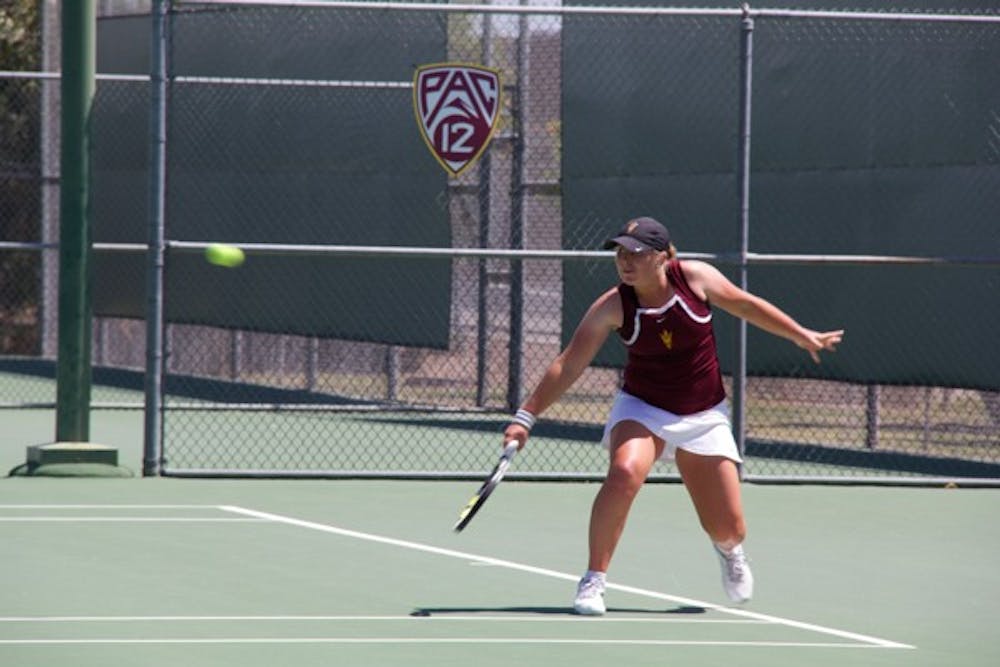 Freshman Gussie O’Sullivan prepares to continue a rally during her singles game against Utah at the Whiteman Tennis Center on April 5. ASU won the match 4-2. (Photo by Becca Smouse)