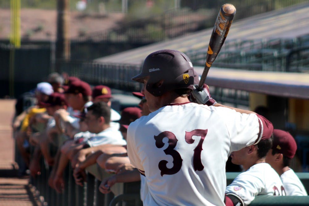 Junior infielder Colby Woodmansee swings while on-deck during the Maroon and Gold scrimmage on Saturday, Feb. 13, 2016, in the Phoenix Municipal Stadium. 
