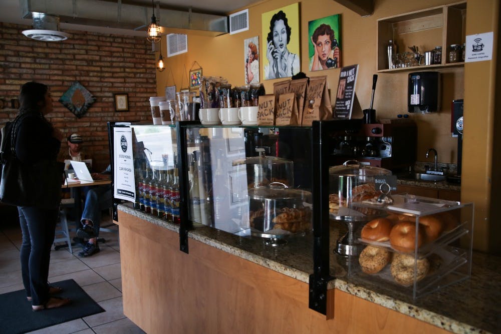 A girl waits in line to order coffee at Kings Coffee on the morning of Tuesday March 29, 2016.