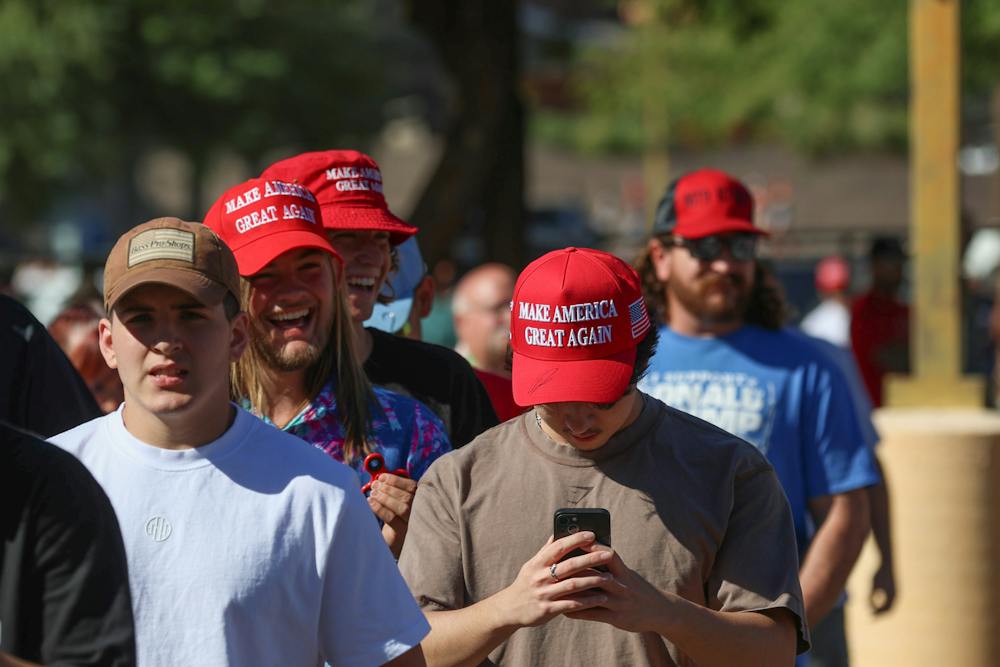 An outside look: Students line up, protest outside of Trump's rally in ...