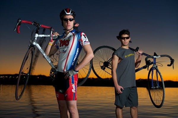 X-COUNTRY: George Stahle and Luis Aguilera, both juniors at ASU in the Pi Kappa Phi fraternity, are pedaling from Seattle, WA to Washington, D.C. The 4,100-mile-long bike ride, an annual charity ride for the fraternity, takes place in June and will raise money and awareness for people with disabilities. (Photo by Michael Arellano)