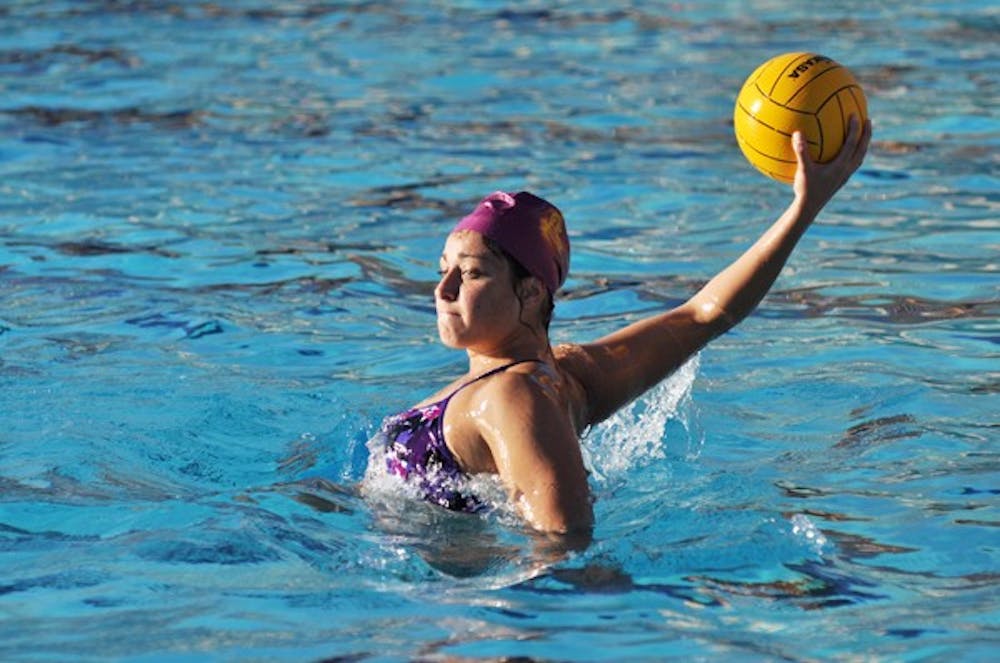 Senior Mariam Salloum looks to pass in a practice on Feb. 24, 2011. After months of preparation, the Sun Devils are eager to start the season. (Photo by Sierra Smith)