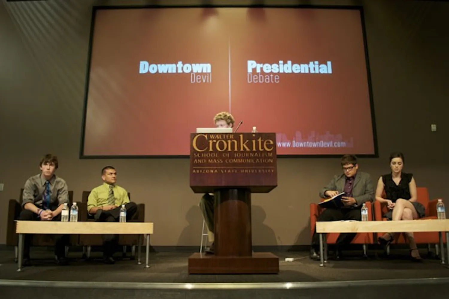 DOWNTOWN DEBATE: From the left: V.P. Vaughn Hillard, President Andres Cano, debate moderator Dan Neligh, Presidential candidate Christian vasquez, VP candidate Jessica Abercrombie in the first amendment forum of the Cronkite School The debate was run by the Downtown Devil. (Photo by Molly Smith)