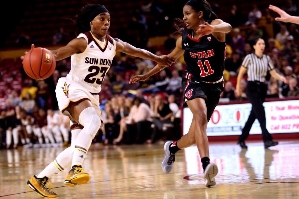 Senior guard Elisha Davis (23) drives down the court on Sunday, Jan. 17, 2015, during the Arizona State women's basketball game against Utah in Wells Fargo Arena in Tempe.