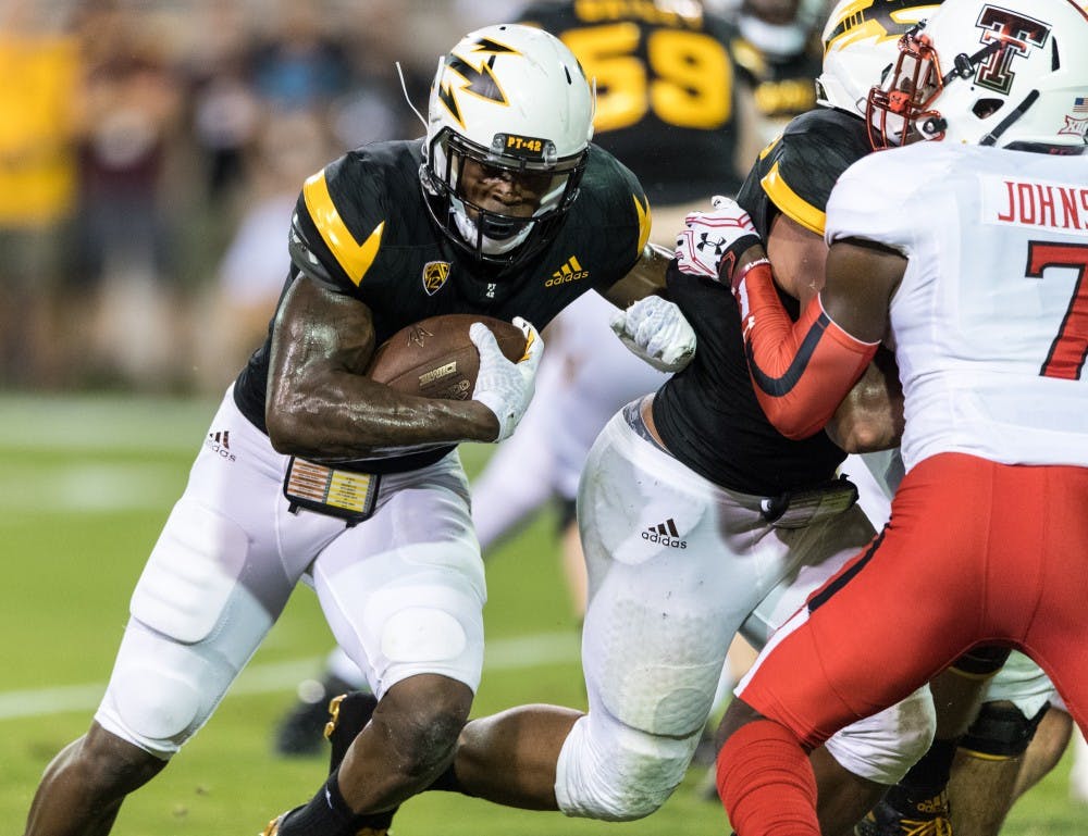 Junior running back Kalen Ballage pushes his way to a touchdown in the second quarter against Texas Tech on Sept. 10, 2016 at Sun Devil Stadium,  in Tempe, Arizona.