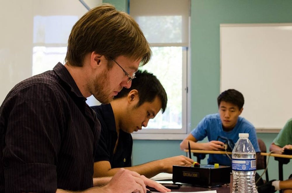 (Left to right) Nathan Davis, Son Vo and Justin Lu compete at an academic competition in October 2013 at ASU.&nbsp;