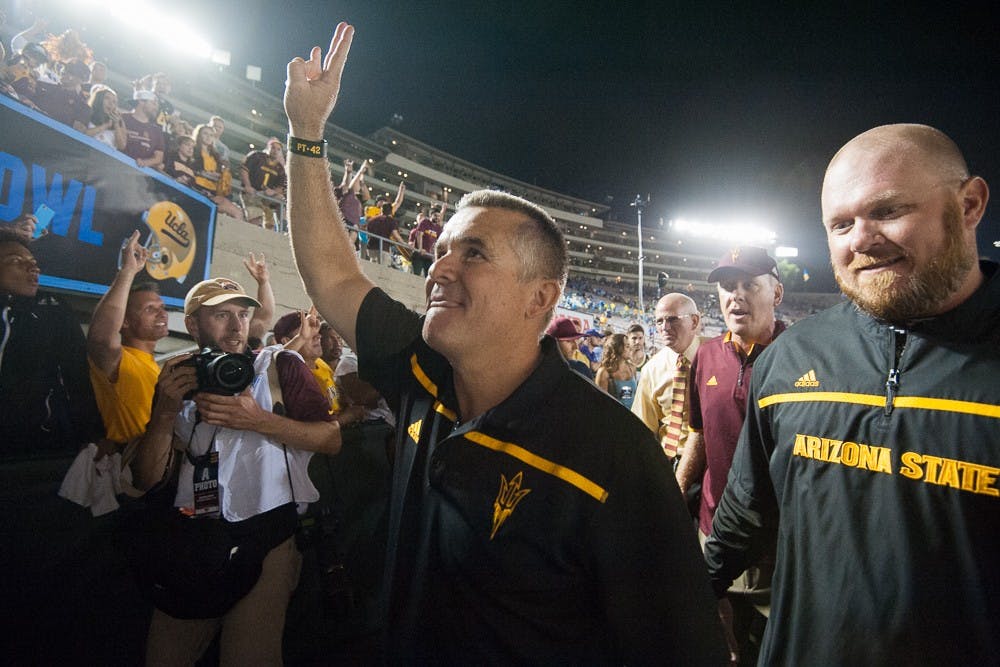 Head coach Todd Graham salutes fans on Saturday, Oct. 3, 2015, at Rose Bowl Stadium in Pasadena, Calif. The Sun Devils defeated the UCLA Bruins 38-23.