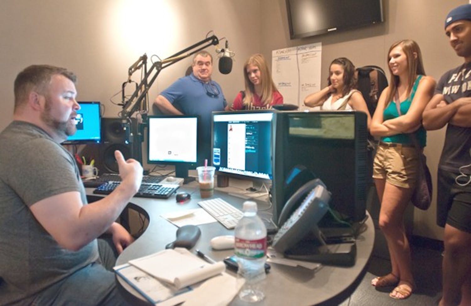 RADIO HEAD: Imaging and creative director at KTAR AM & FM, Jason Veazey, discusses his trade with students from the Cronkite School of Journalism and Mass Communication during a tour of KTAR's studios on Wednesday.  (Photo submission by Mitchell Weinstock)