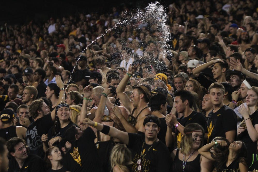 The ASU student section celebrates the ASU-Wisconsin victory. The Sun Devils won 32-30. (Photo by Dominic Valente)