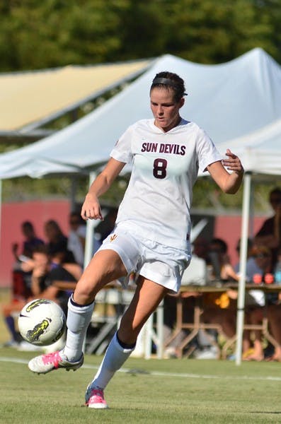 TOUGH CAMPAIGN: ASU sophomore forward Devin Marshall handles the ball during the Sun Devils’ 1-0 win over Washington on Oct. 30. Plagued with injuries all season, the ASU soccer team finished their 2011 campaign 8-11 and missed the NCAA tournament. (Photo by Aaron Lavinsky)