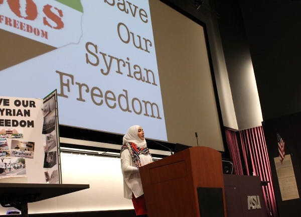 Yisser Bittar, 23 and advocate of the Syrian American Council, speaks at an event hosted by Save Our Syrian Freedom. (Photo by Laura Davis)