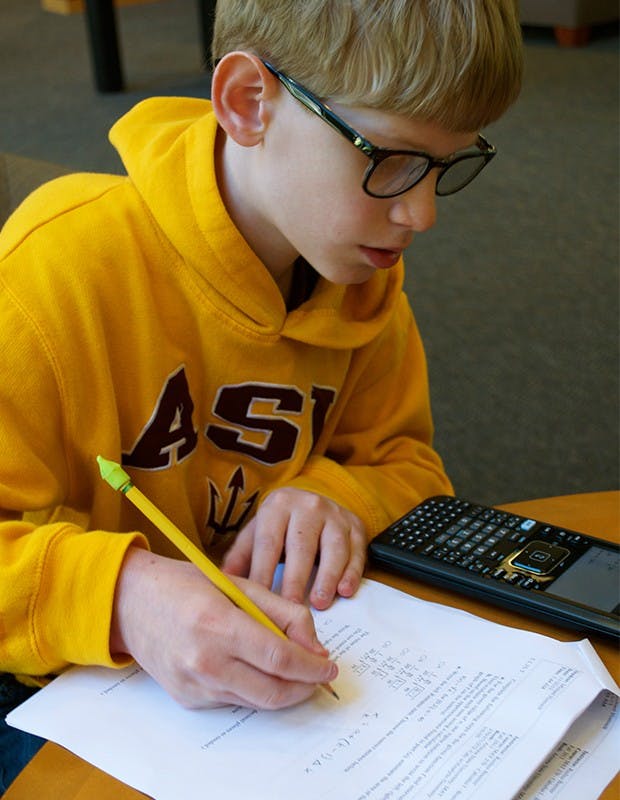 While many students his age have curfews and bedtimes, Hoenack finds himself staying sometimes past midnight to complete work.
Photo by Luu Nguyen