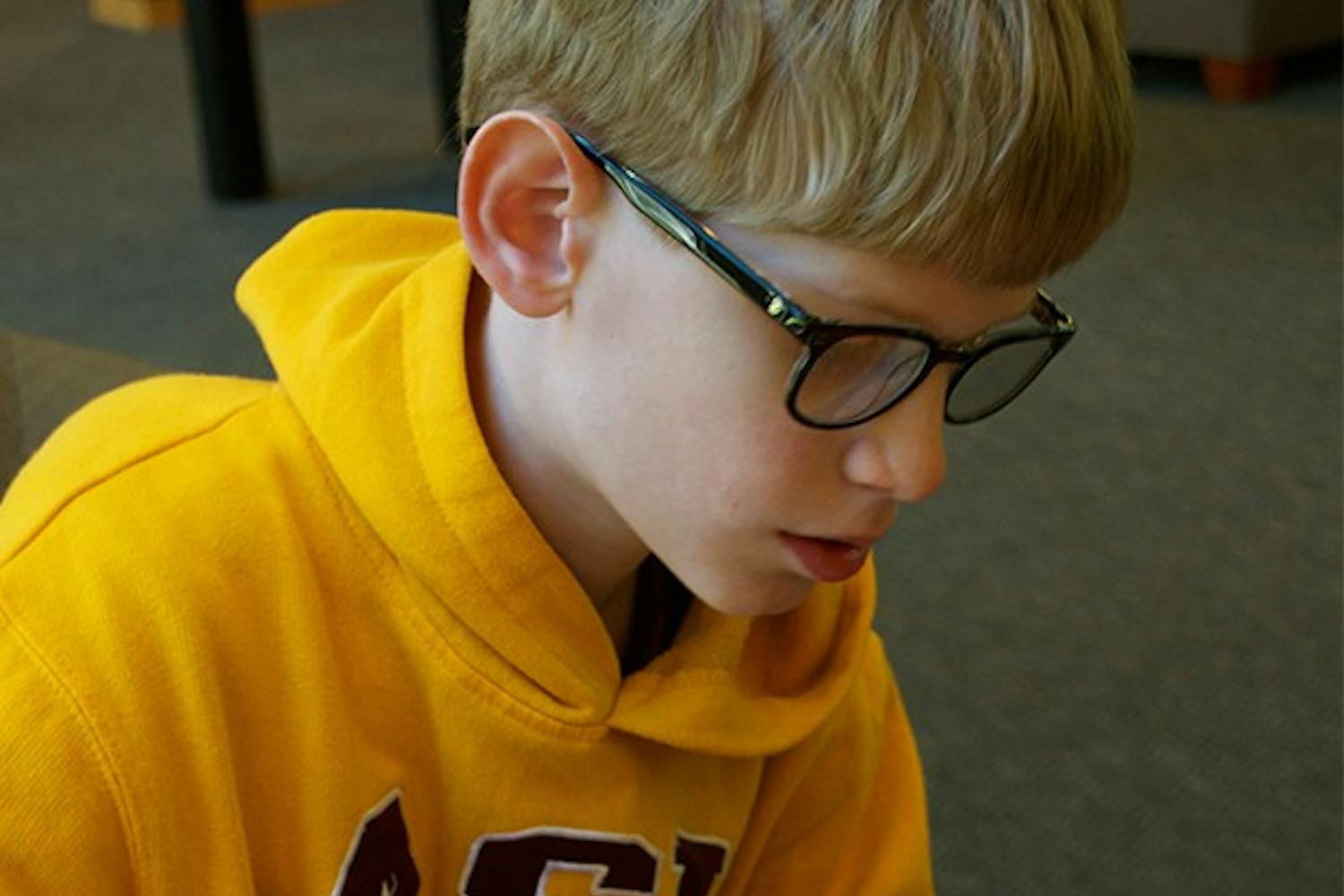 While many students his age have curfews and bedtimes, Hoenack finds himself staying sometimes past midnight to complete work.
Photo by Luu Nguyen
