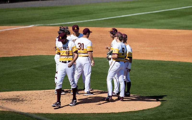 TEMPE, AZ - APRIL 15: Former ASU Sun Devil Dustin Pedroia gets honored  before a baseball game between the Arizona State Sun Devils and University  of Southern California Trojans on April 15