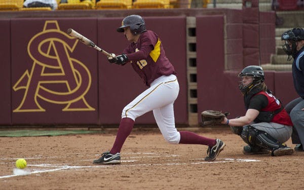 PROTECT THE PLATE: ASU senior infielder Katie Crabb hits a foul ball during the Sun Devils' 14-0 win against Rutgers in February. The Sun Devils are in Los Angeles to take on No. 5 UCLA in a three-game series starting Friday night.  (Photo by Michael Arellano)