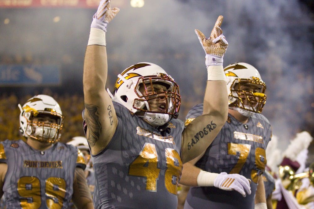 ASU linebacker Frank Ogas (48) hypes up the crowd before the game versus the UCLA Bruins in Sun Devil Stadium in Tempe, Arizona, on Saturday, Oct. 8, 2016.