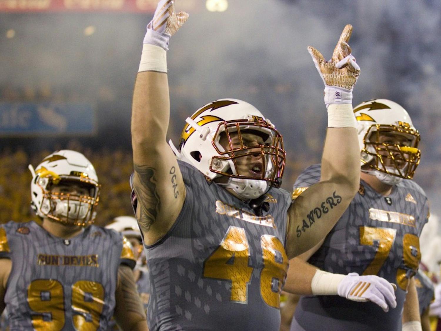ASU linebacker Frank Ogas (48) hypes up the crowd before the game versus the UCLA Bruins in Sun Devil Stadium in Tempe, Arizona, on Saturday, Oct. 8, 2016.