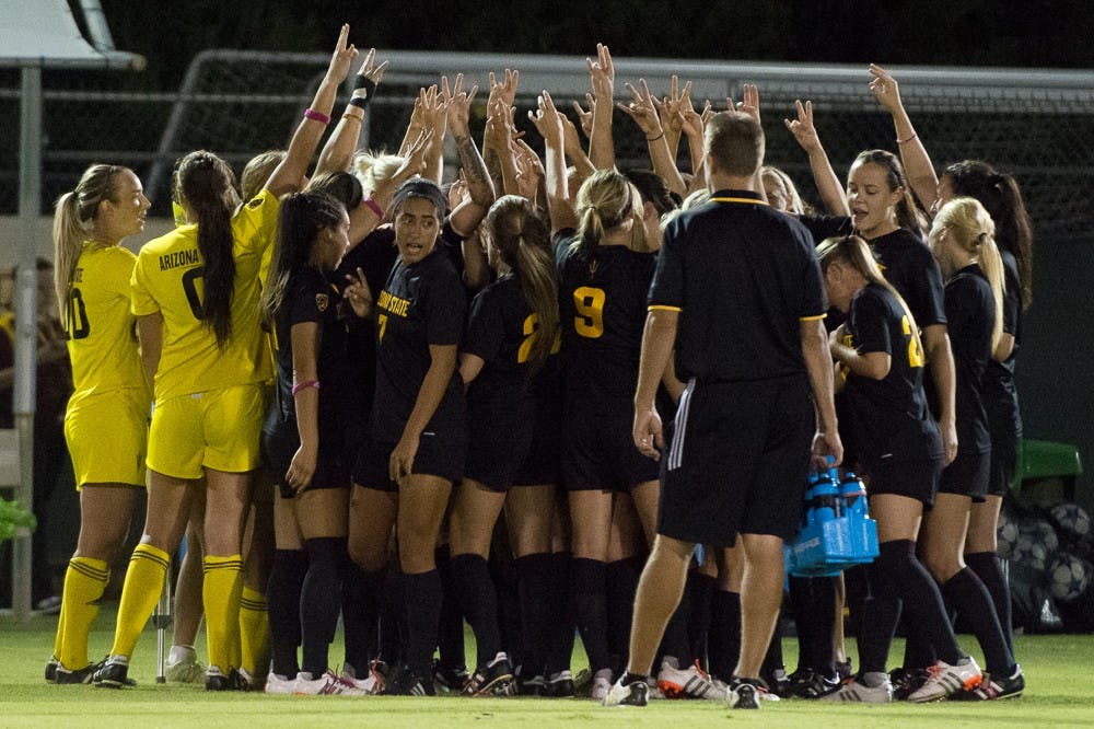 ASU's soccer team huddles before a game against Oregon State on Friday, Oct. 23, 2015, at Sun Devil Soccer Stadium in Tempe.