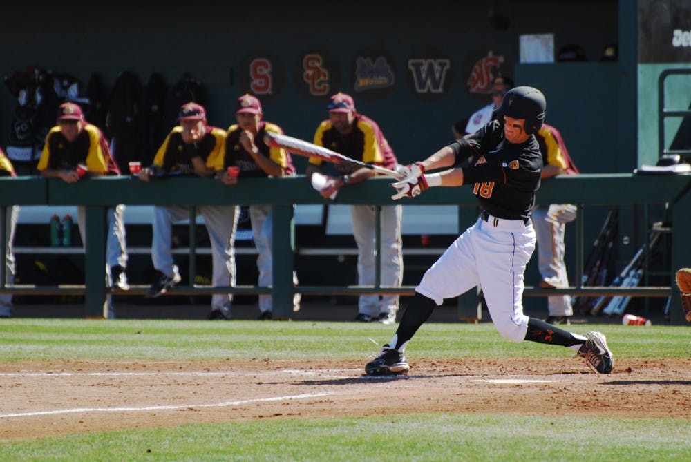 Freshman outfielder Johnny Sewald follows through on a swing against Bethune-Cookman on Feb. 17. The ASU baseball team won their first series of the season over the Wildcats 2-1. (Photo by Murphy Bannerman)
