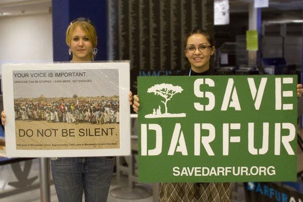 SPEACK UP FOR AFRICA: Wynter Fenn (right) and Christina Massey, president and vice president of STAND at ASU, are working hard to inform students about the genocide in Africa and raise awareness and support to take action. (Photo by Annie Wechter)
