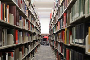 FINALS STRESS: A student studies at the library. The amount of people at the library will be increasing in the next week because of finals. (Photo by Nikolai de Vera)