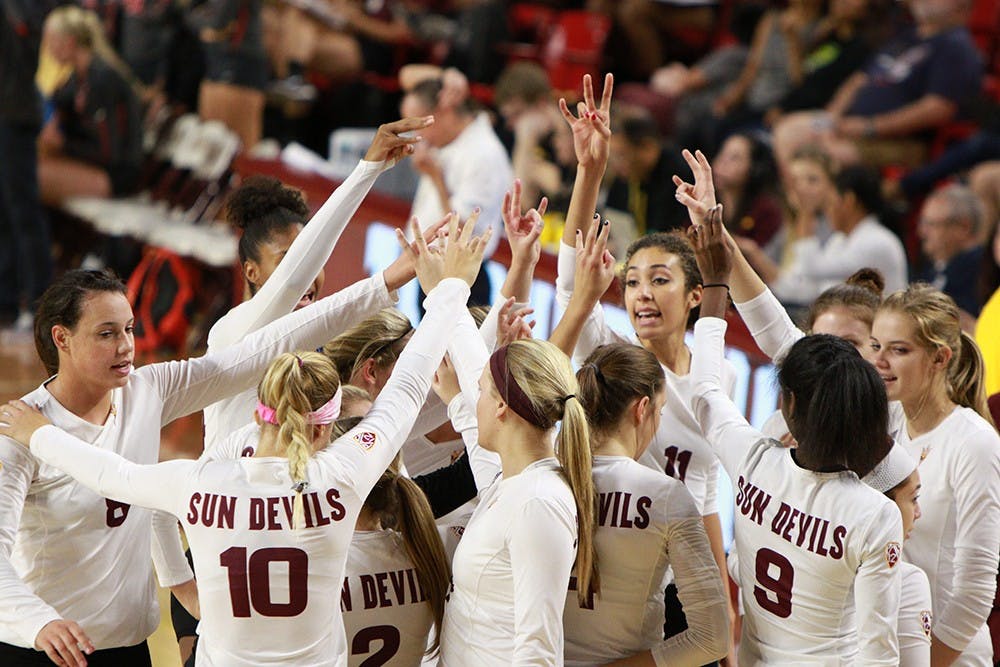 The Arizona State University volleyball team gathers before the end of a timeout in the first set against University of Nevada, Las Vegas during the Red Lion Invitational on Friday, Sept. 18, 2015 at Wells Fargo Arena in Tempe. The Sun Devils defeated the Rebels 3 games to none (25-10, 25-21, 25-15).