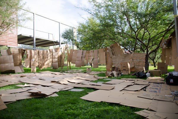 Carboard boxes line the area near the union at the Polytechnic campus where students would sleep during the 2013 Polytechnic $2 challenge. (Photo by Andrew Ybanez)