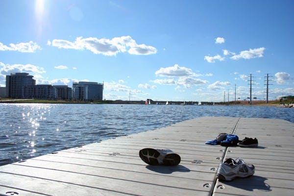 Tempe residents shed their shoes to enjoy Tempe Town Lake last February. Candidate for mayor Michael Monti is proposing a new swimming area, adding another activity for residents to participate in while visiting the lake. (Photo by Lisa Bartoli)