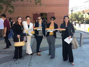 Some voters handed out nonpartisan cupcakes to encourage ASU students to express their right to vote outside of the Sun Devil Fitness Complex&nbsp;on Election Day on Nov. 8,&nbsp;2016.