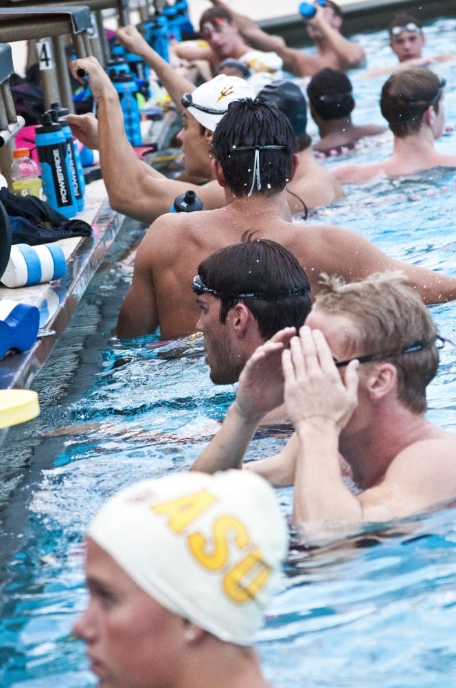 The men's and women's swim team warm up before a practice in Tempe. (Photo by Katie Dunphy)