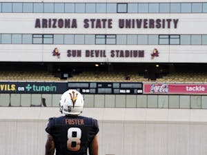 Senior wide receiver D.J. Foster looks on at ongoing construction at Sun Devil Stadium during ASU's spring game on April 11, 2015.