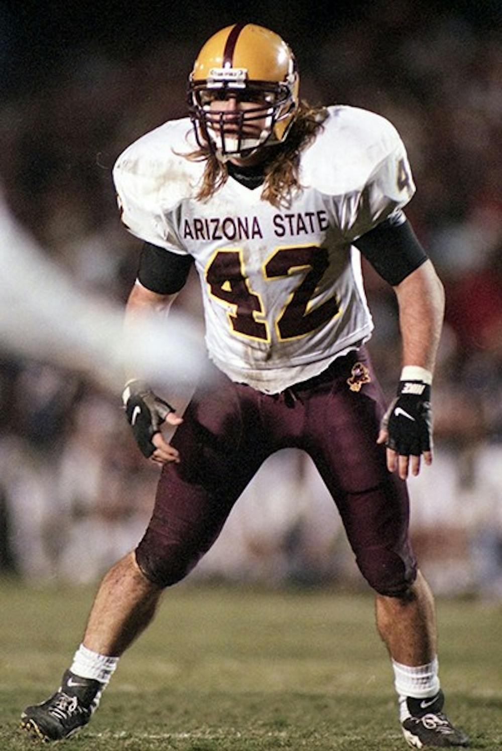 Pat Tillman, former linebacker for the Sun Devils, lines up before a play. (Photo courtesy of ASU Athletics)