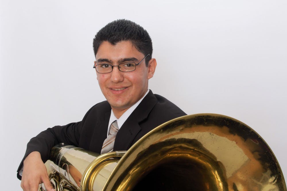 Third-year undergraduate music performance student Ramon Garavito, Jr. poses with his tuba in September,&nbsp;2014. He will be performing in his fourth undergraduate recital on Saturday Oct. 29, 2016.