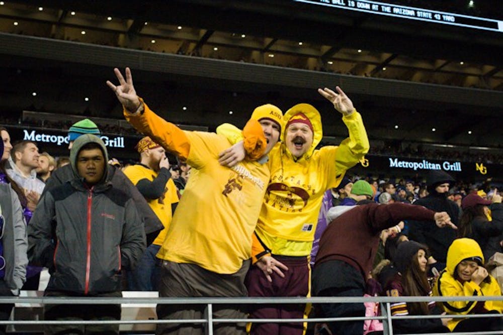 Sun Devil football fans cheer for ASU during the game against Washington on Oct. 25 at Husky Stadium. ASU defeated Washington 24-10. (Photo by Andrew Ybanez)