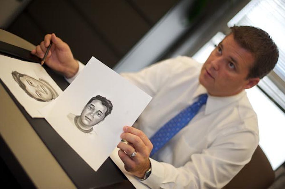 ROUGH SKETCH: Commander Mike Thompson of the ASU Police Department explains the technique he uses to sketch composites of suspects and unidentified victims of violence. (Photo by Michael Arellano)