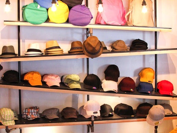 TIP YOUR HATS: One of the new businesses opening on Mill Avenue is Icon, a modern clothing store. (Photo by Lisa Bartoli)