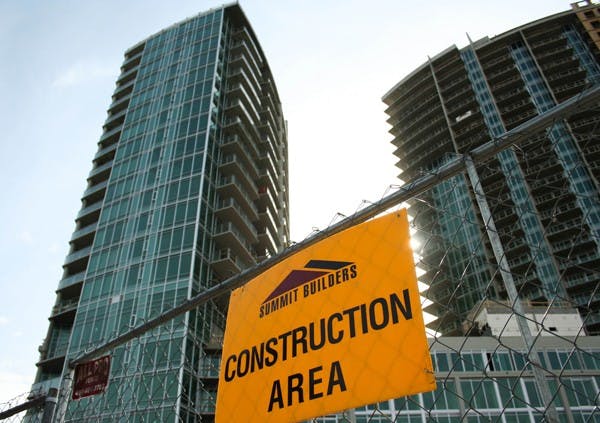 COMING SOON TO MILL: West Sixth off of Mill Avenue, formerly known as the Centerpoint Towers, was purchased in February by the Zaremba Group. The company is now leasing out condominiums pending the project’s long-awaited completion this summer. (Photo by Lisa Bartoli)