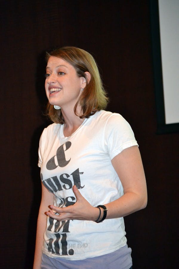 Meg Watkins, a representative for The Global Poverty Project, presents the 1.4 Billion Reasons multi-media presentation, which discusses problems, roadblocks and solutions for global poverty. Watkins is traveling with four other representatives across the nation to spread the message of this project and empower people to help in anyway they can. (Photo by Mackenzie McCreary)