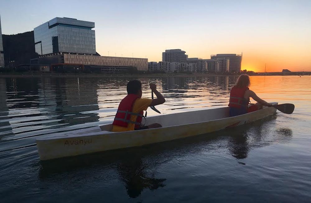 Sophomore civil engineering major Connor Fegard and his teammate row down Tempe Town Lake on Friday, Oct. 21, 2016.