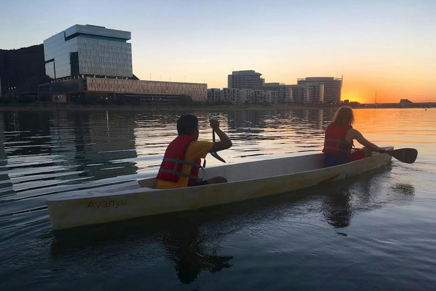 Sophomore civil engineering major Connor Fegard and his teammate row down Tempe Town Lake on Friday, Oct. 21, 2016.