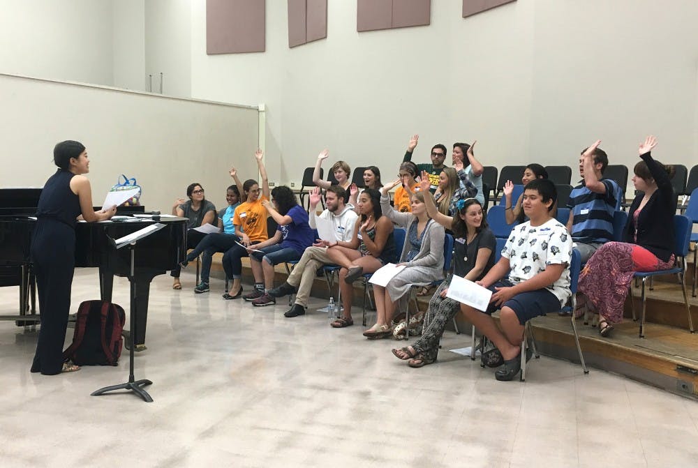Ruihao Zhang engages the Rainbow Connection before they start their next activity on Sunday, Sept. 25, 2016.