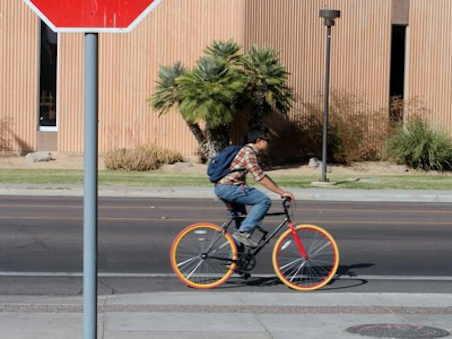 The House Transportation Committee passed House Bill 2211, which will allow bicyclists 16 and older to treat a stop sign as a yield sign. The bill still needs to be passed by two other committees before reaching the House. (Photo by Adrian Juarez)