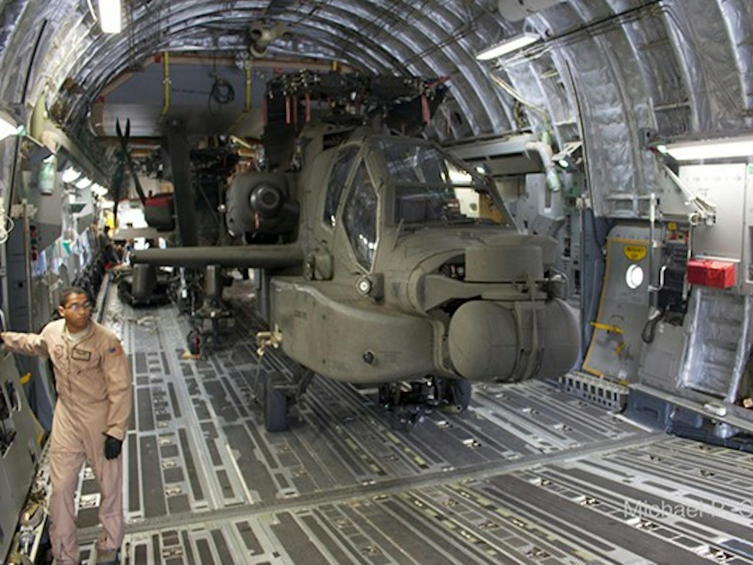 A group of soldiers sits around a table during a reception for the launch of the Office for Veteran and Military Academic Engagement. (Photo by Diana Lustig)