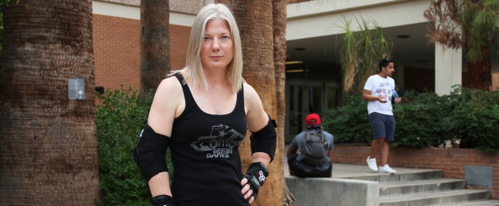 British Literature professor Devoney Looser covers many playing fields on and off campus. When she isn't teaching, the literature-enthusiast is playing roller derby under the alter-ego Stone Cold Jane Austen. (Photo by Diana Lustig)