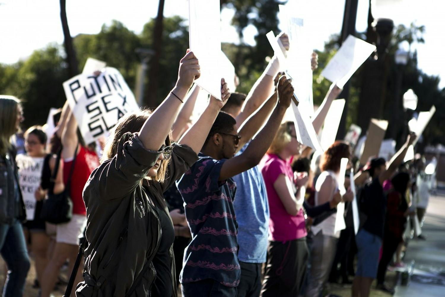 Students chant during a protest of the 2016 presidential election results near the Old Main building on the ASU Tempe campus on Friday, Nov. 11, 2016. 