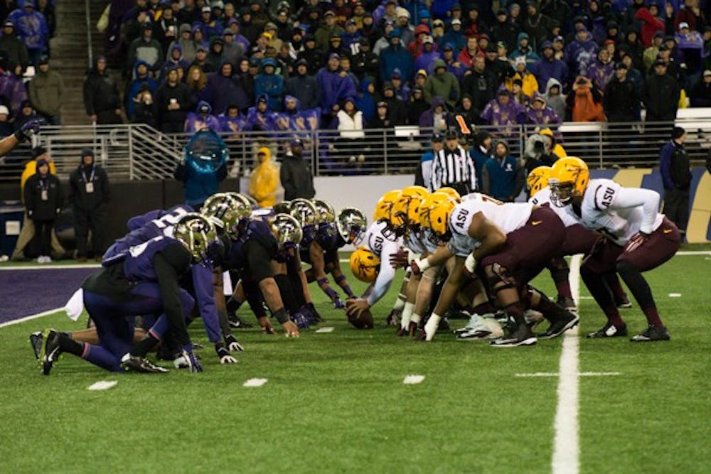 Sun Devil offense lines up against Washington near the end zone during the game against Washington on Oct. 25. ASU defeated Washington 24-10. (Photo by Andrew Ybanez)