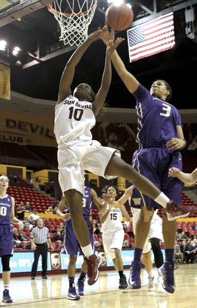 Sophomore guard Promise Amukamara’s shot is blocked by Washington redshirt freshman forward Talia Walton on Feb. 3. The ASU women’s basketball team hopes to salvage their season in their next games at home. (Photo by Sam Rosenbaum)
