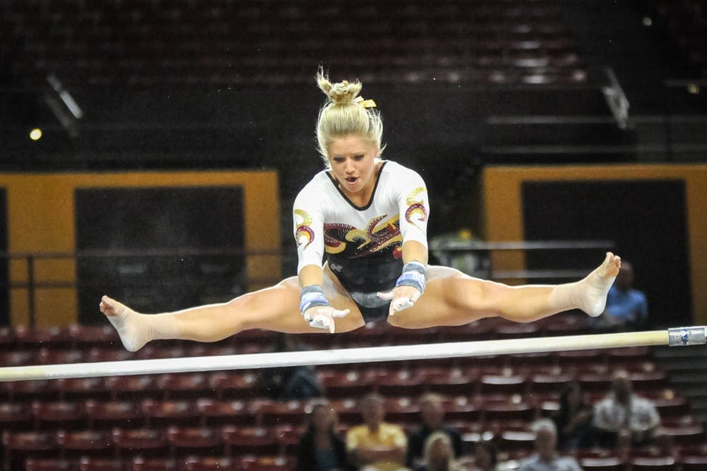 Freshman Katelyn Lentz performs on the uneven bars during the meet against the Arizona on Monday, Feb. 22, 2016, at the Wells Fargo Arena in Tempe.