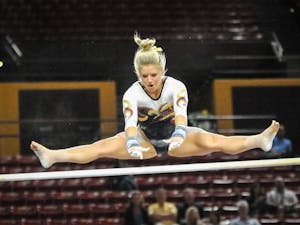 Freshman Katelyn Lentz performs on the uneven bars during the meet against the Arizona on Monday, Feb. 22, 2016, at the Wells Fargo Arena in Tempe.